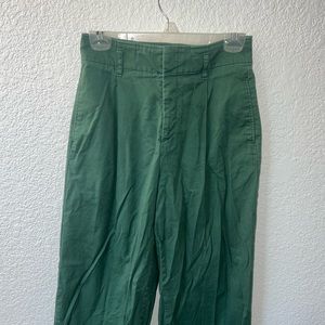 High-waisted green flare pants